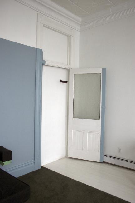 Digital image IRC.2013.01403 showing Allan Wexler's permanent installation, Bed-Sitting Room for Artist in Residence [left], and Pati Beachley's installation, Slip [right], at the Mattress Factory, 2005.