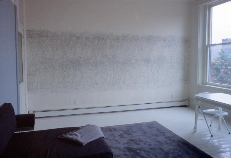 slide IRC.2012.00085 showing Allan Wexler's permanent installation, Bed-Sitting Room for Artist in Residence [left], and William Anastasi's permanent installation, April 15 1989, 32 Minutes, 4B [right] at the Mattress Factory, 1989.
