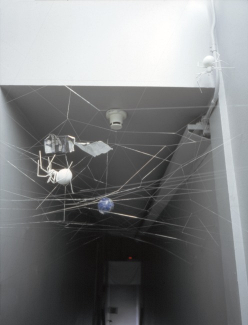 slide IRC.2012.00518 showing Paul Bowden's installation, Reward Yourself with Free Gasoline, at the Mattress Factory, 2001.