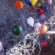 Photograph Depicting Qin Yufen,<em> Beautiful Violence</em>, 2001 at the Mattress Factory