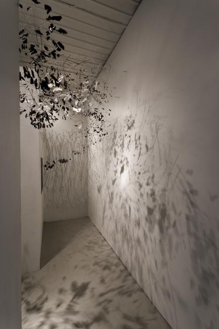 Digital image IRC.2012.05987 showing Garry Pyles's installation, There’s a black cloud/But, we make the weather/Shit it's raining, at the Mattress Factory, 2011.