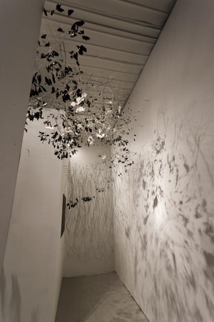 Digital image IRC.2012.05986 showing Garry Pyles's installation, There’s a black cloud/But, we make the weather/Shit it's raining, at the Mattress Factory, 2011.