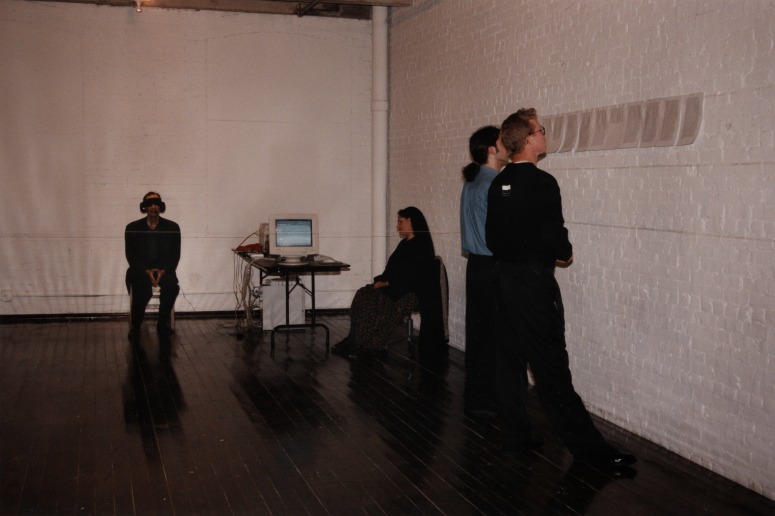 print IRC.2012.02842 showing William Anastasi's performance, Printed Out, at the Mattress Factory, 1997.