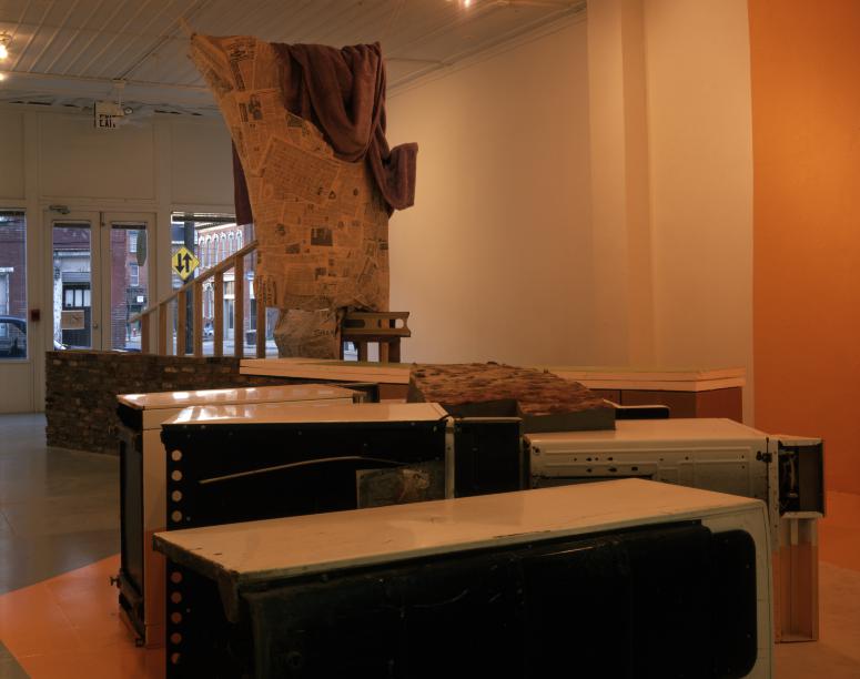 Photograph Depicting Jessica Stockholder, <em>Mixing Food with the Bed</em>, 1989 at the Mattress Factory