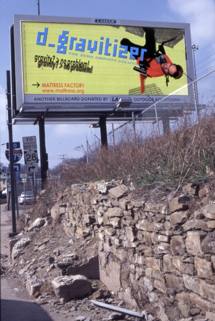 slide IRC.2012.02319 (old number: KIM.S-D056) showing a billboard for Sora Kim's installation, D-Gravitizer, at the Mattress Factory, 1999.