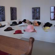 Digital image IRC.2013.01038 showing Jo-Anne Bates's installation, Sunday Mornin = Hats, Hats &amp; Mo Hats, at the Mattress Factory, 2003.