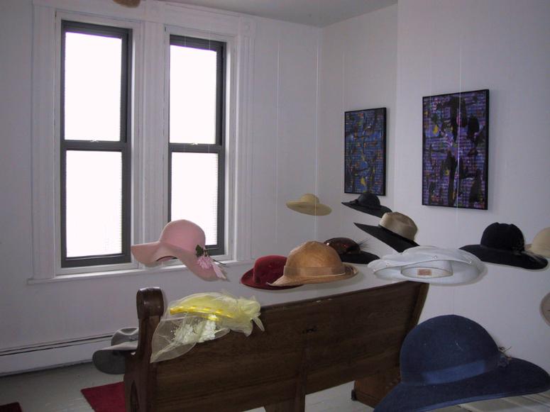 Digital image IRC.2013.01012 showing Jo-Anne Bates's installation, Sunday Mornin = Hats, Hats &amp; Mo Hats, at the Mattress Factory, 2003.