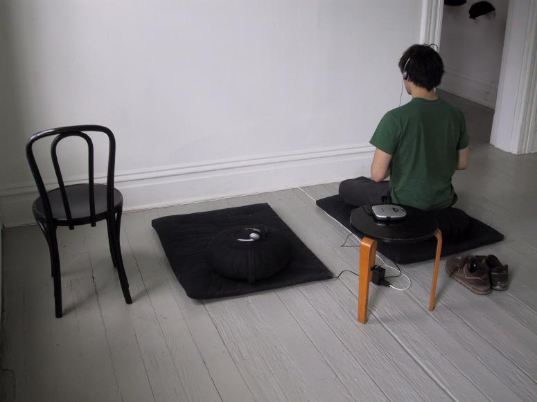 Digital image IRC.2013.00665 showing Kyoki Roberts's installation, Nowhere to Go; Nothing to Do: Just Sitting, at the Mattress Factory, 2003.