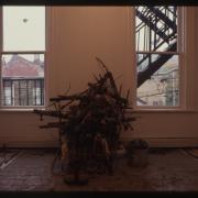 slide IRC.2012.03097 (old number: JON.K-U001) showing Kim Jones's untitled performance at the Mattress Factory, 1990.