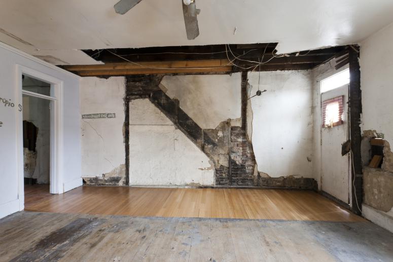 Digital image IRC.2012.05702 showing Seamus Nolan's installation, 310-312 Sampsonia Way, For Sale by Owner, Great Opportunity, at the Mattress Factory, 2011.