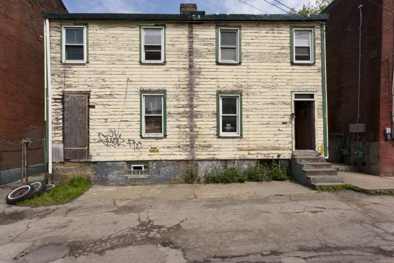 Digital image IRC.2012.05714 showing Seamus Nolan's installation, 310-312 Sampsonia Way, For Sale by Owner, Great Opportunity, at the Mattress Factory, 2011.