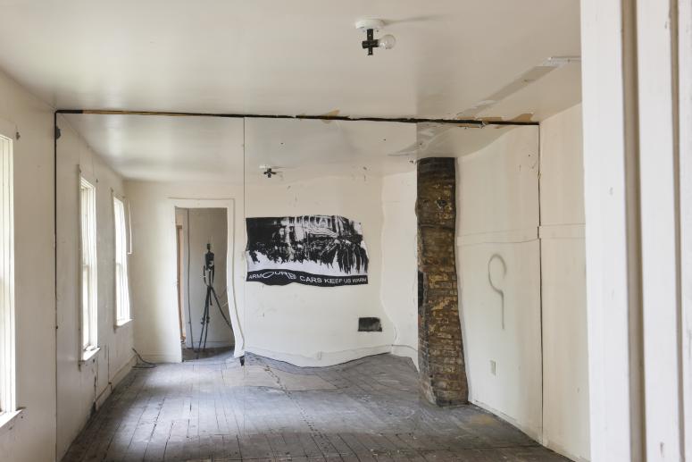 Digital image IRC.2012.05704 showing Seamus Nolan's installation, 310-312 Sampsonia Way, For Sale by Owner, Great Opportunity, at the Mattress Factory, 2011.