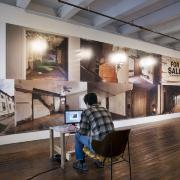 Digital image IRC.2012.05720 showing Seamus Nolan's installation, 310-312 Sampsonia Way, For Sale by Owner, Great Opportunity, at the Mattress Factory, 2011.