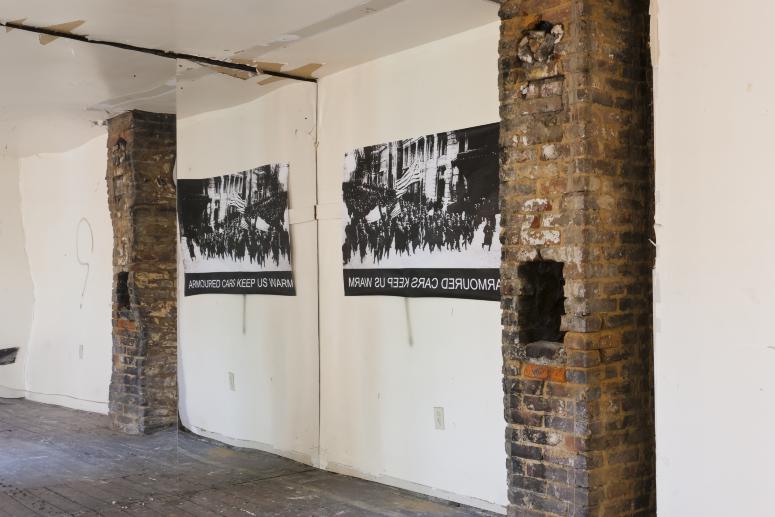 Digital image IRC.2012.05710 showing Seamus Nolan's installation, 310-312 Sampsonia Way, For Sale by Owner, Great Opportunity, at the Mattress Factory, 2011.