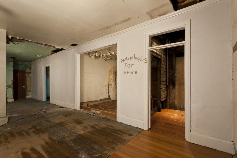 Digital image IRC.2012.05657 showing Seamus Nolan's installation, 310-312 Sampsonia Way, For Sale by Owner, Great Opportunity, at the Mattress Factory, 2011.