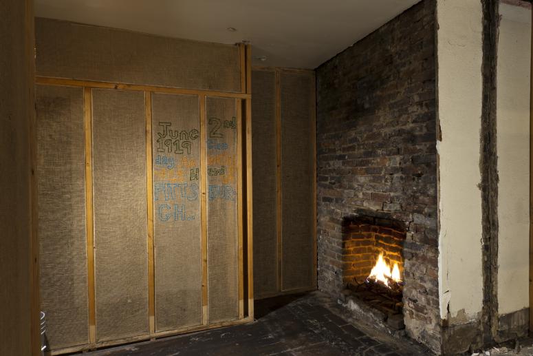 Digital image IRC.2012.05682 showing Seamus Nolan's installation, 310-312 Sampsonia Way, For Sale by Owner, Great Opportunity, at the Mattress Factory, 2011.