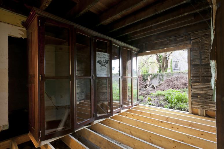 Digital image IRC.2012.05684 showing Seamus Nolan's installation, 310-312 Sampsonia Way, For Sale by Owner, Great Opportunity, at the Mattress Factory, 2011.