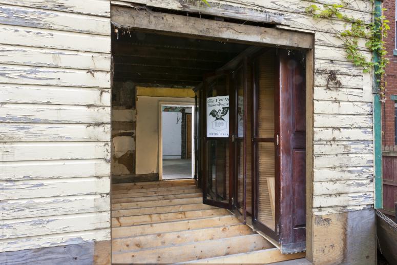 Digital image IRC.2012.05687 showing Seamus Nolan's installation, 310-312 Sampsonia Way, For Sale by Owner, Great Opportunity, at the Mattress Factory, 2011.