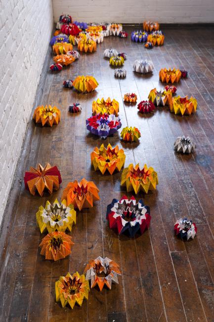 Digital image IRC.2012.06973 showing Glenn Lougran's installation, Squatter Sovereignty: Origami Fireworks, at the Mattress Factory, 2011.