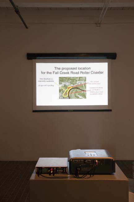 Digital image IRC.2012.04725 showing Jonn Herschend's installation, Self Portrait as a PowerPoint Proposal for an Amusement Park Ride, at the Mattress Factory, 2009.