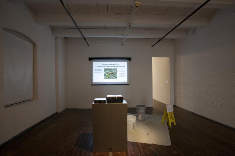 Digital image IRC.2012.04733 showing Jonn Herschend's installation, Self Portrait as a PowerPoint Proposal for an Amusement Park Ride, at the Mattress Factory, 2009.