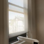 Digital image IRC.2012.04157 showing Dee Briggs's installation, Art You Can Get into...If You Have $12, at the Mattress Factory, 2012.