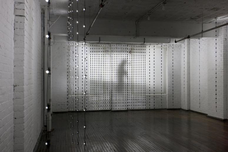 Digital image IRC.2012.04214 showing Jim Campbell's installation, Liz Walking: A Distillation Portrait, at the Mattress Factory, 2009.