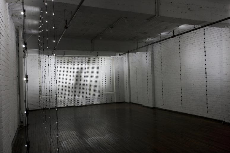 Digital image IRC.2012.04222 showing Jim Campbell's installation, Liz Walking: A Distillation Portrait, at the Mattress Factory, 2009.