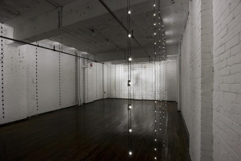 Digital image IRC.2012.04204 showing Jim Campbell's installation, Liz Walking: A Distillation Portrait, at the Mattress Factory, 2009.