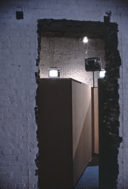 slide IRC.2012.03668 (old number: SCH.B-T006) showing Buky Schwartz's installation, Three Angles of Coordination for Monitoring the Labyrinthian Space, at the Mattress Factory, 1986.