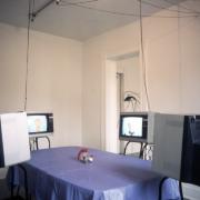 slide IRC.2012.00562 (old number: BUR.D-U001) showing Diana Burgoyne's Untitled installation at the Mattress Factory, 1991.