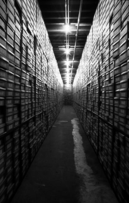 slide IRC.2012.00512 (old number: BOL.C-A002) showing Christian Boltanski's installation, Archives of the Carnegie International, 1896-1991, at the Mattress Factory, 1991.