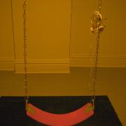 Installation Photograph Depicting Jeffrey Carpenter, <em>Swing Set Summer</em>, 2005 at the Mattress Factory 