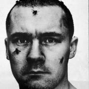Photograph depicting artist Damien Hirst