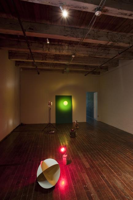 Digital image IRC.2013.03766 showing Reflector [foreground] and Transmitter [background], two parts of David Beattie's exhibition, Old Light, New Darkness, at the Mattress Factory, 2010.