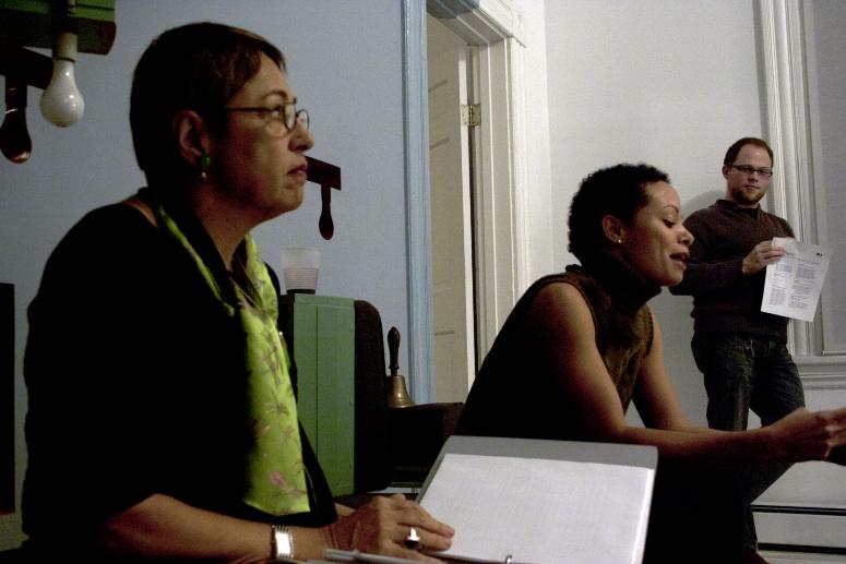 Digital image IRC.2013.03100 showing Toi Derricotte's performance, Landscape of the Body - Poems, and Allan Wexler's permanent installation, Bed-Sitting Room for Artist in Residence, at the Mattress Factory, 2005.