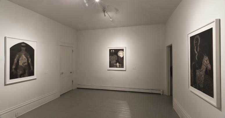 Digital image IRC.2013.03020 showing Belkis Ayón's work, Sikan (left), Untitled [Sikan, Nasako, and the Holy Spirit] (middle), and Even If We Go to Heaven They Will Always Remember Us (right), at the Mattress Factory, 2010.